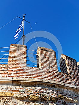 Greek Flag Flying on the White Tower, Salonika, Greece photo